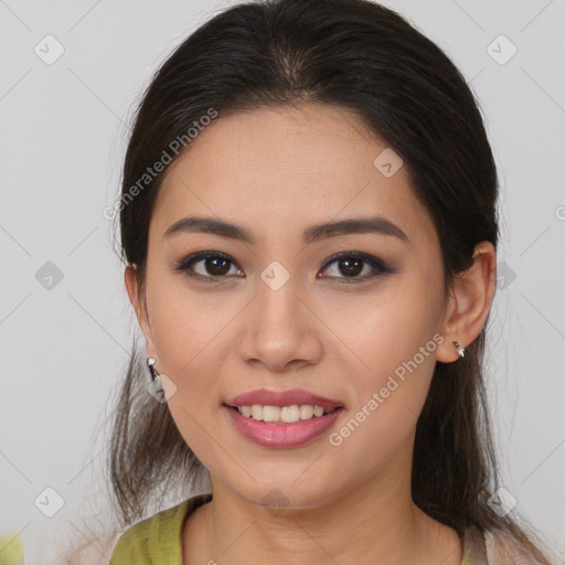 Joyful white young-adult female with medium  brown hair and brown eyes