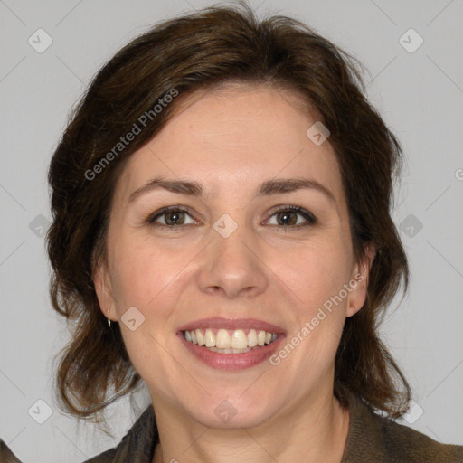 Joyful white young-adult female with medium  brown hair and green eyes