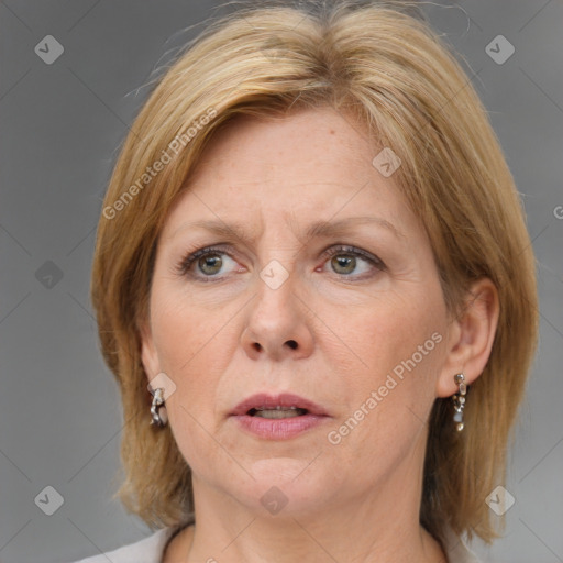 Joyful white adult female with medium  brown hair and grey eyes