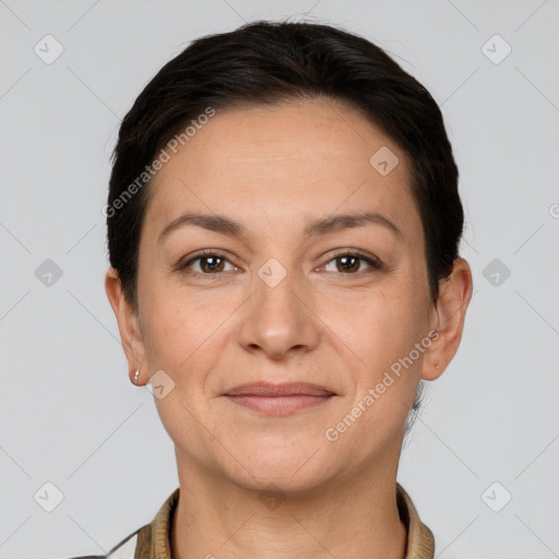 Joyful white young-adult female with short  brown hair and grey eyes