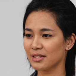 Joyful asian young-adult female with medium  black hair and brown eyes