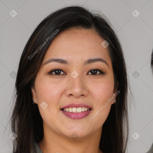 Joyful asian young-adult female with long  brown hair and brown eyes