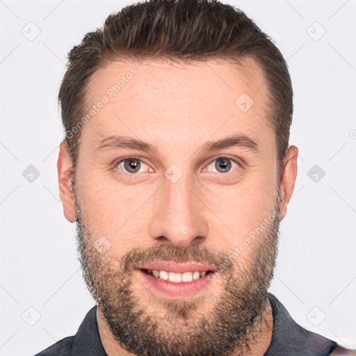 Joyful white adult male with short  brown hair and brown eyes