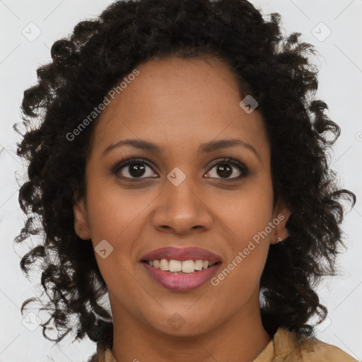 Joyful black young-adult female with long  brown hair and brown eyes