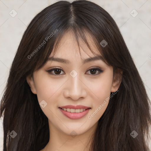 Joyful asian young-adult female with long  brown hair and brown eyes