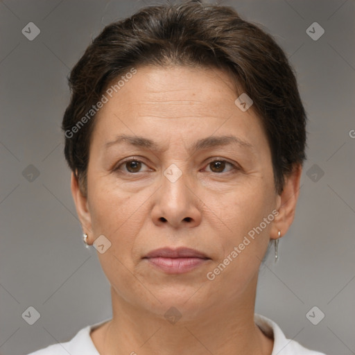 Joyful white adult female with short  brown hair and brown eyes