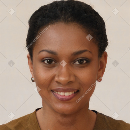 Joyful black young-adult female with short  black hair and brown eyes