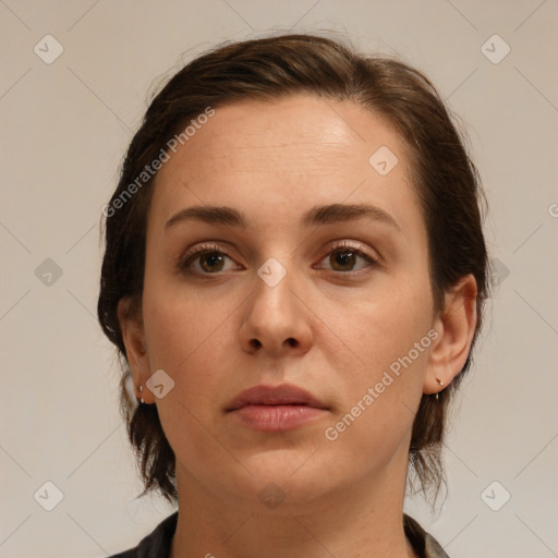 Neutral white young-adult female with medium  brown hair and brown eyes