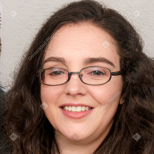 Joyful white adult female with long  brown hair and grey eyes