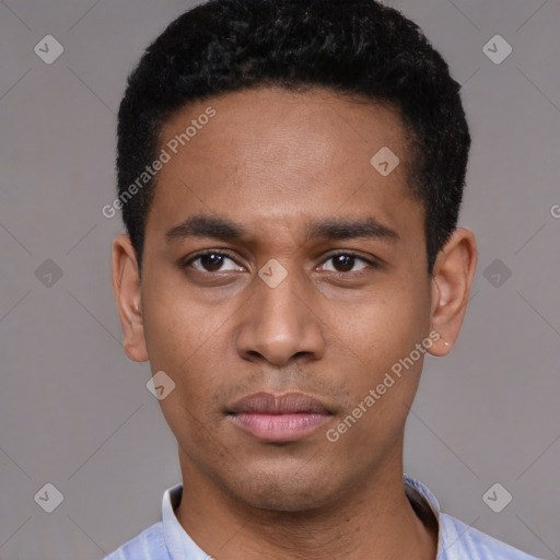 Neutral latino young-adult male with short  black hair and brown eyes