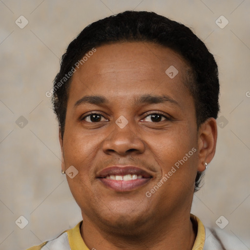 Joyful black young-adult male with short  brown hair and brown eyes