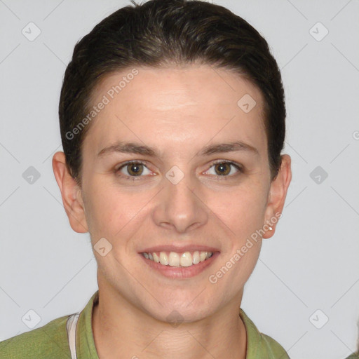 Joyful white young-adult female with short  brown hair and grey eyes