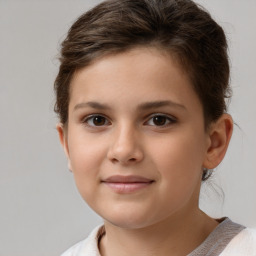 Joyful white child female with short  brown hair and brown eyes