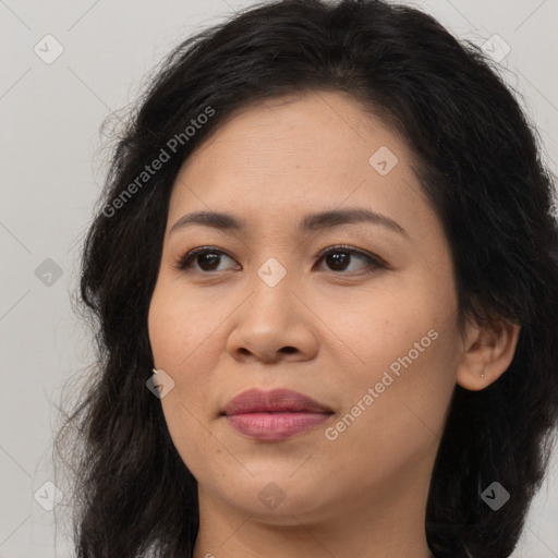 Joyful asian young-adult female with long  brown hair and brown eyes