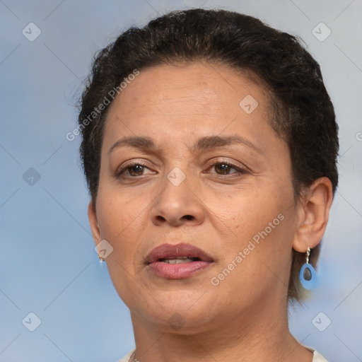 Joyful white adult female with short  brown hair and brown eyes