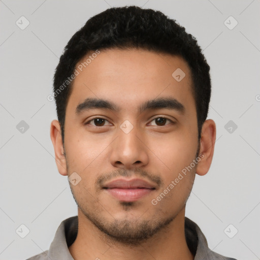 Neutral latino young-adult male with short  black hair and brown eyes