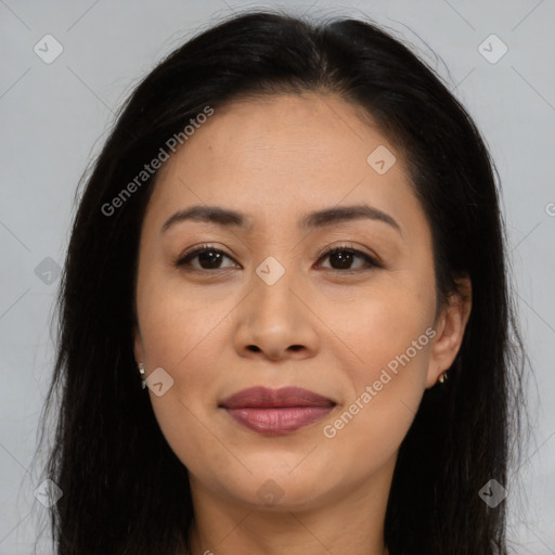 Joyful asian young-adult female with long  brown hair and brown eyes