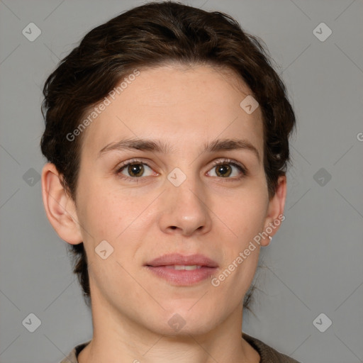 Joyful white young-adult female with short  brown hair and grey eyes