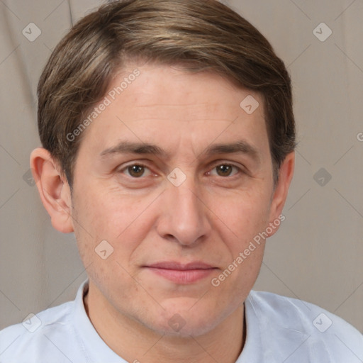 Joyful white adult male with short  brown hair and brown eyes