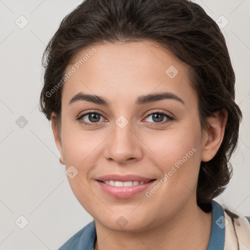 Joyful white young-adult female with medium  brown hair and grey eyes