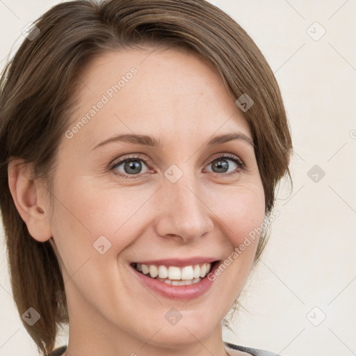 Joyful white young-adult female with medium  brown hair and grey eyes