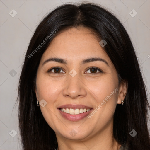 Joyful white adult female with long  brown hair and brown eyes