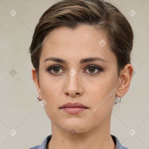 Neutral white young-adult female with short  brown hair and brown eyes