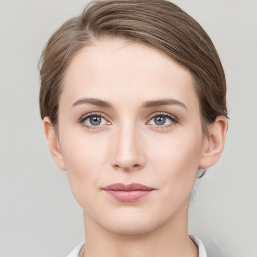 Neutral white young-adult female with medium  brown hair and grey eyes