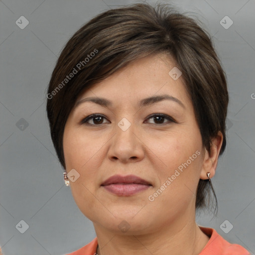 Joyful white adult female with short  brown hair and brown eyes