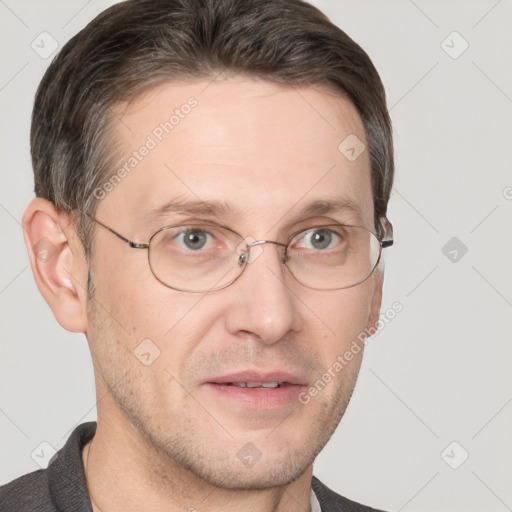 Joyful white adult male with short  brown hair and grey eyes