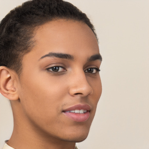 Joyful latino young-adult female with short  brown hair and brown eyes