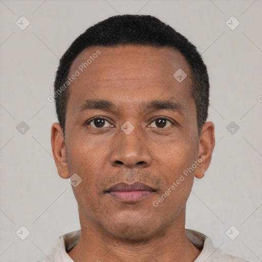 Neutral black adult male with short  black hair and brown eyes