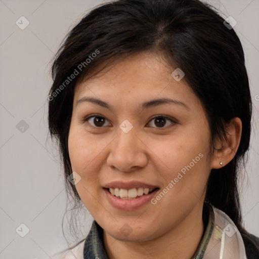 Joyful white young-adult female with medium  brown hair and brown eyes