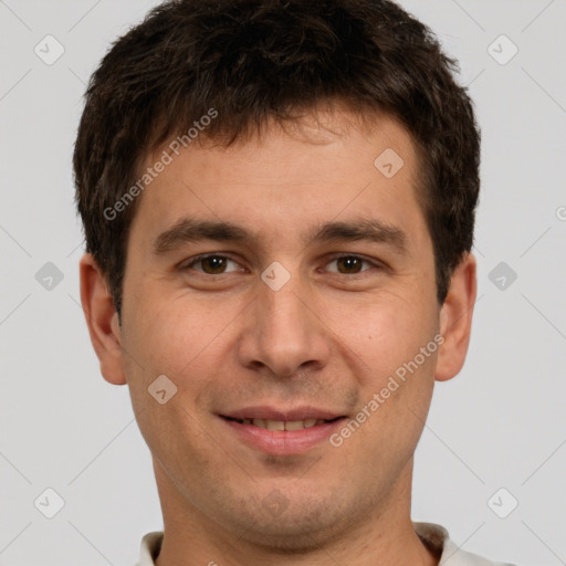 Joyful white young-adult male with short  brown hair and brown eyes