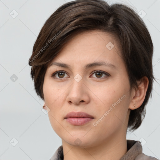 Joyful white young-adult female with medium  brown hair and brown eyes