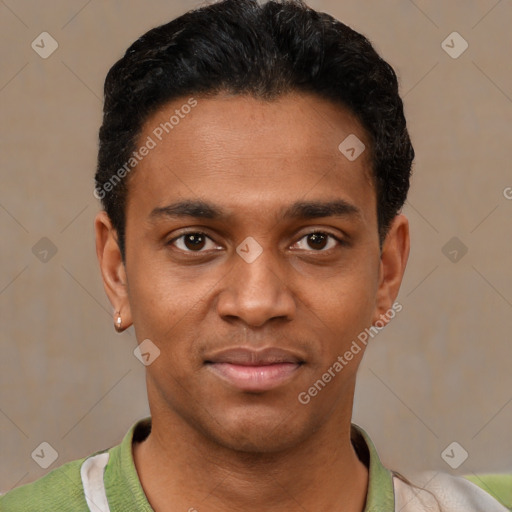 Joyful black young-adult male with short  black hair and brown eyes