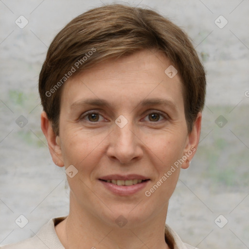 Joyful white adult female with short  brown hair and grey eyes