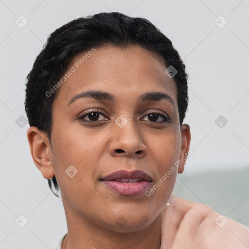 Joyful latino young-adult female with short  brown hair and brown eyes