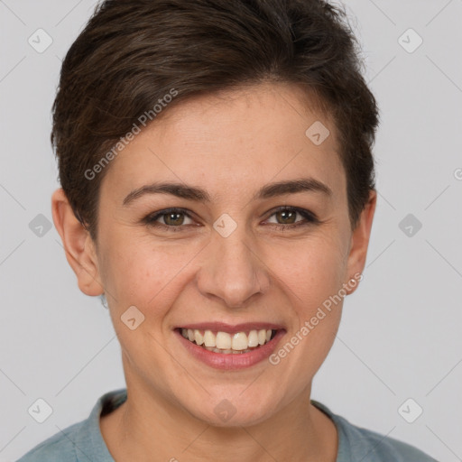 Joyful white young-adult female with short  brown hair and brown eyes