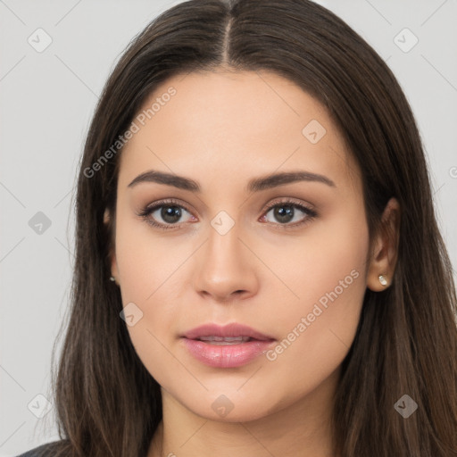 Neutral white young-adult female with long  brown hair and brown eyes