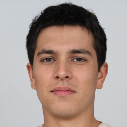 Neutral asian young-adult male with short  brown hair and brown eyes