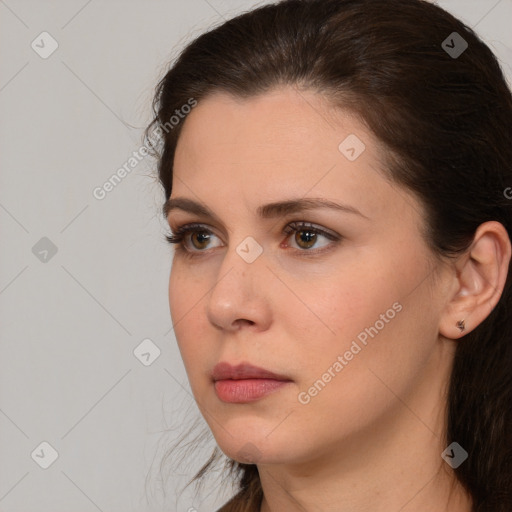 Neutral white young-adult female with medium  brown hair and brown eyes