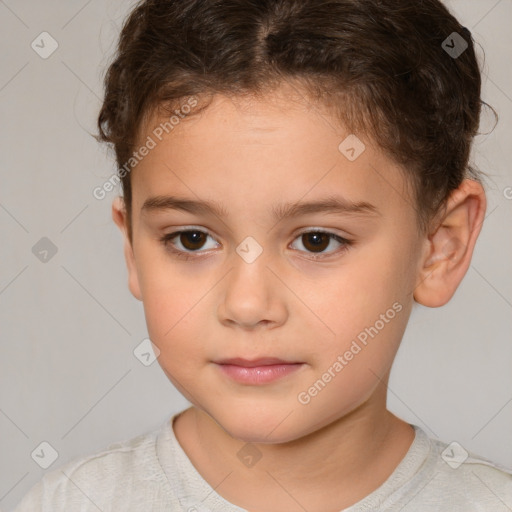 Joyful white child female with short  brown hair and brown eyes