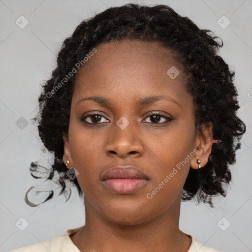 Neutral black young-adult female with medium  brown hair and brown eyes