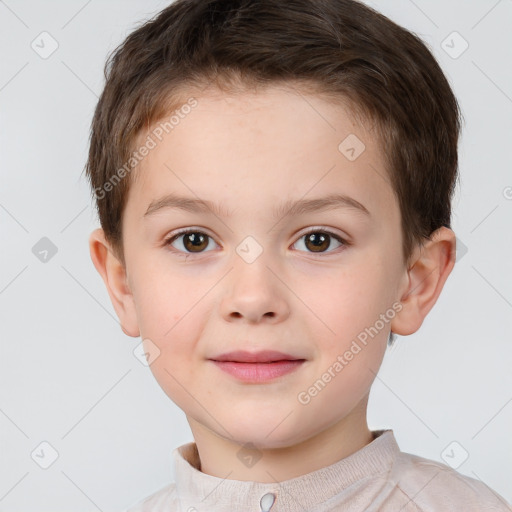 Joyful white child male with short  brown hair and brown eyes