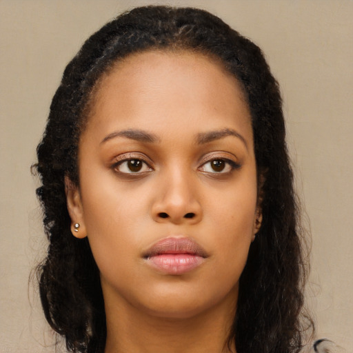 Neutral black young-adult female with long  brown hair and brown eyes