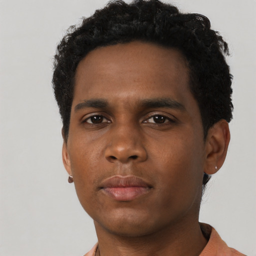 Neutral black young-adult male with short  brown hair and brown eyes