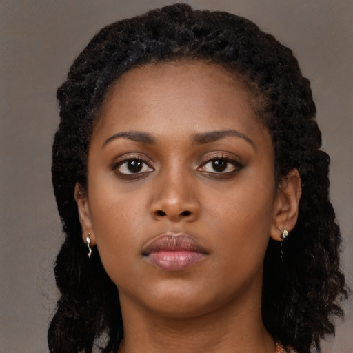 Neutral black young-adult female with long  black hair and brown eyes