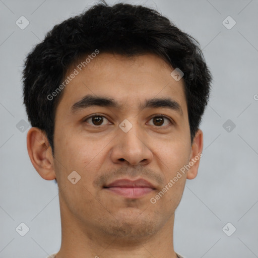 Joyful latino young-adult male with short  brown hair and brown eyes