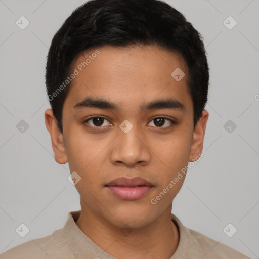 Joyful latino young-adult male with short  black hair and brown eyes